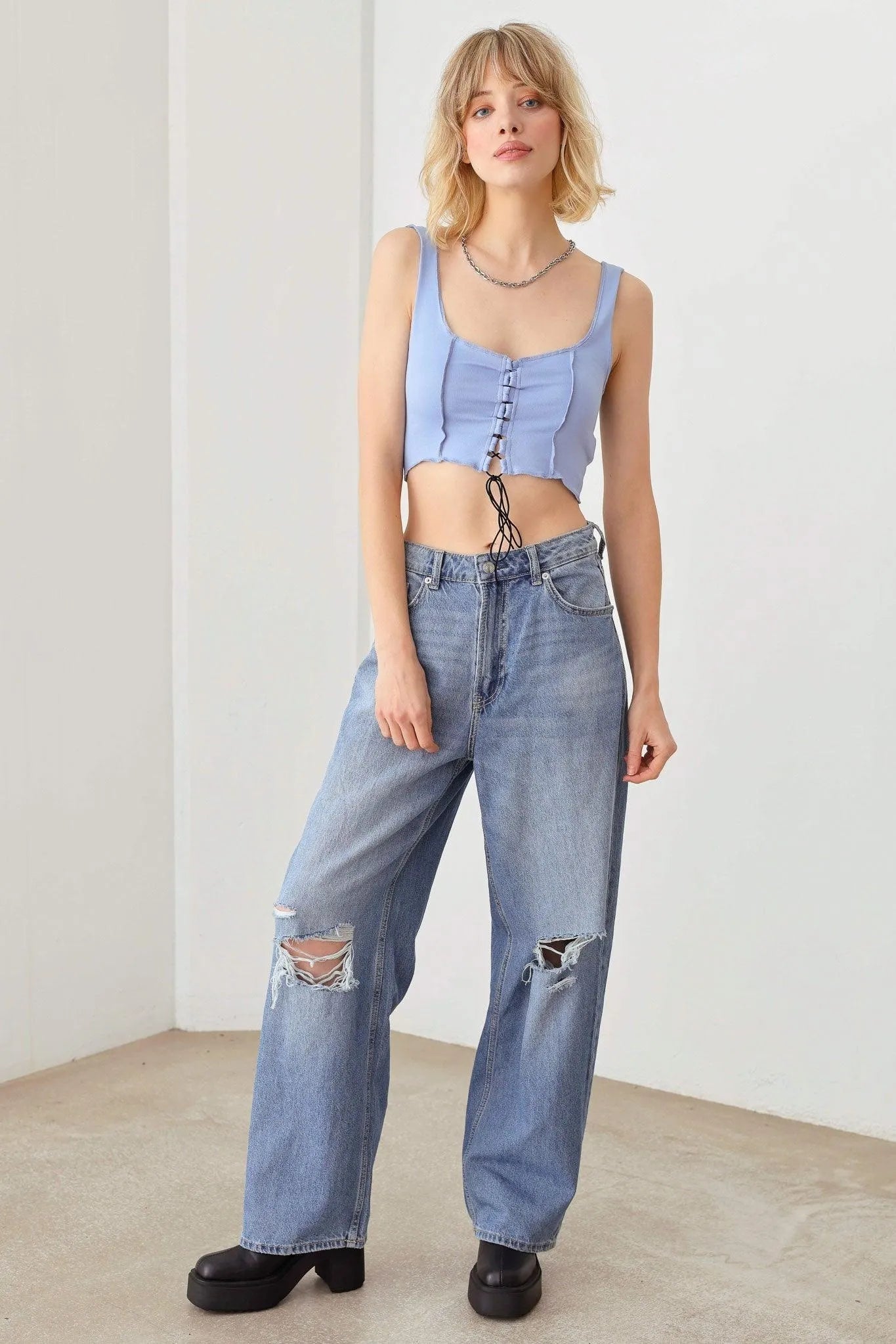 t4610-white-6-solid-lace-up-sleeveless-round-neckline-front-and-back-crop-top-tasha-apparel-wholesale-17